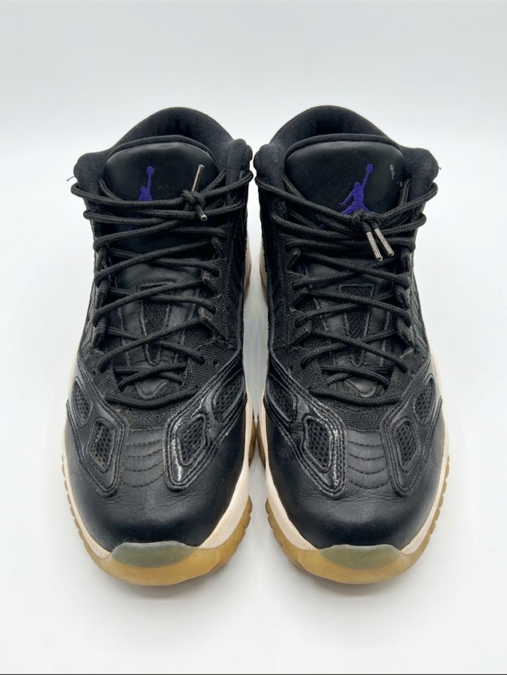 Jordan 11 Retro with Purple Jumpman and Gum Sole